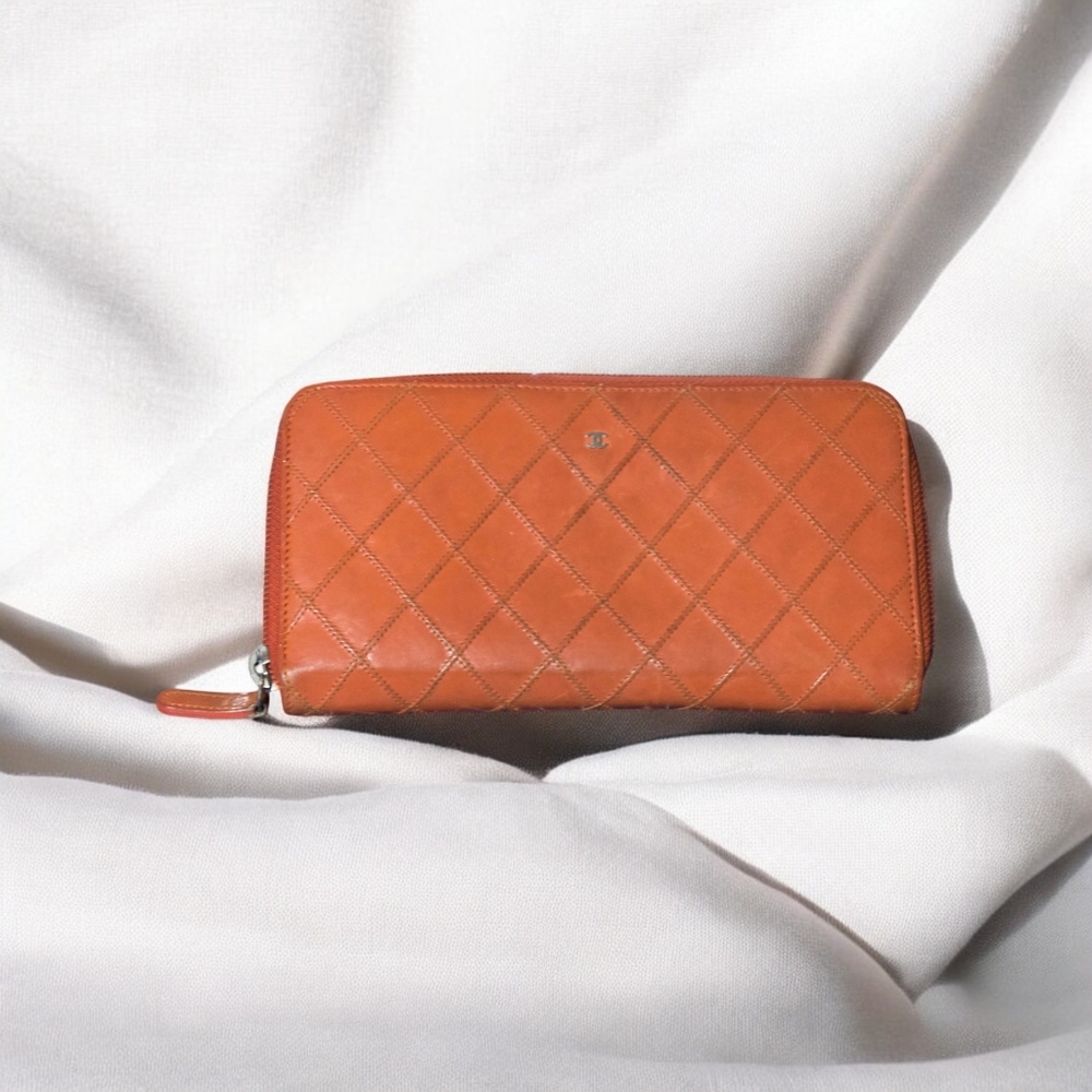 CHANEL Orange Qulited Leather Zip Wallet